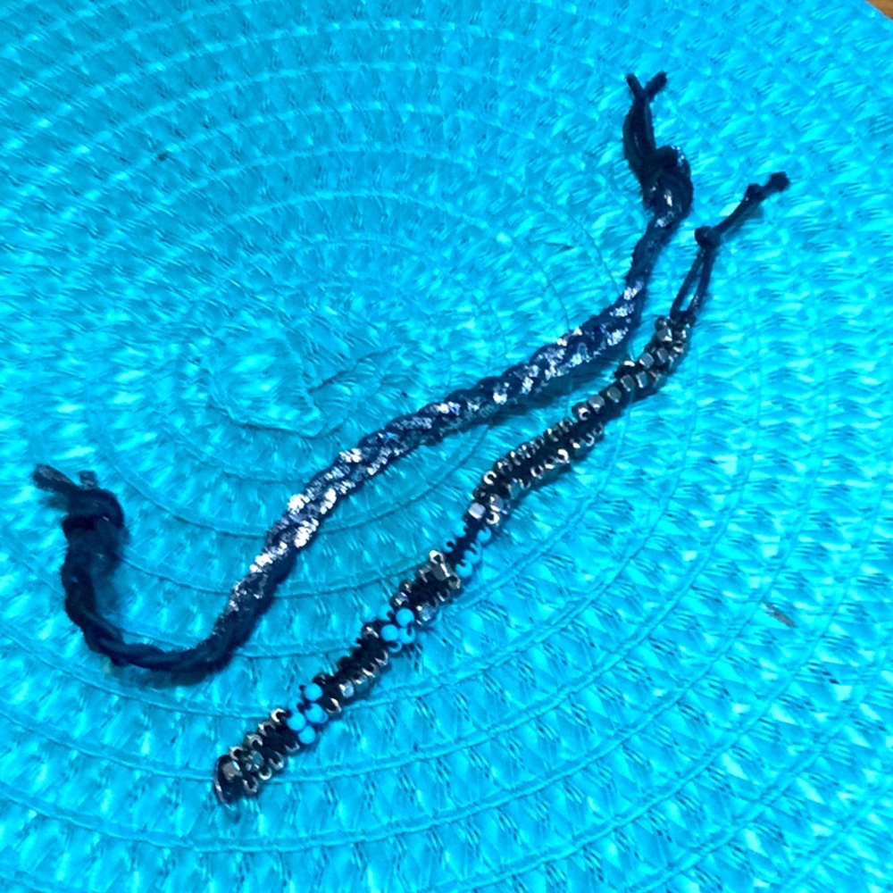 Two handmade black, gold, turq, silver bracelets